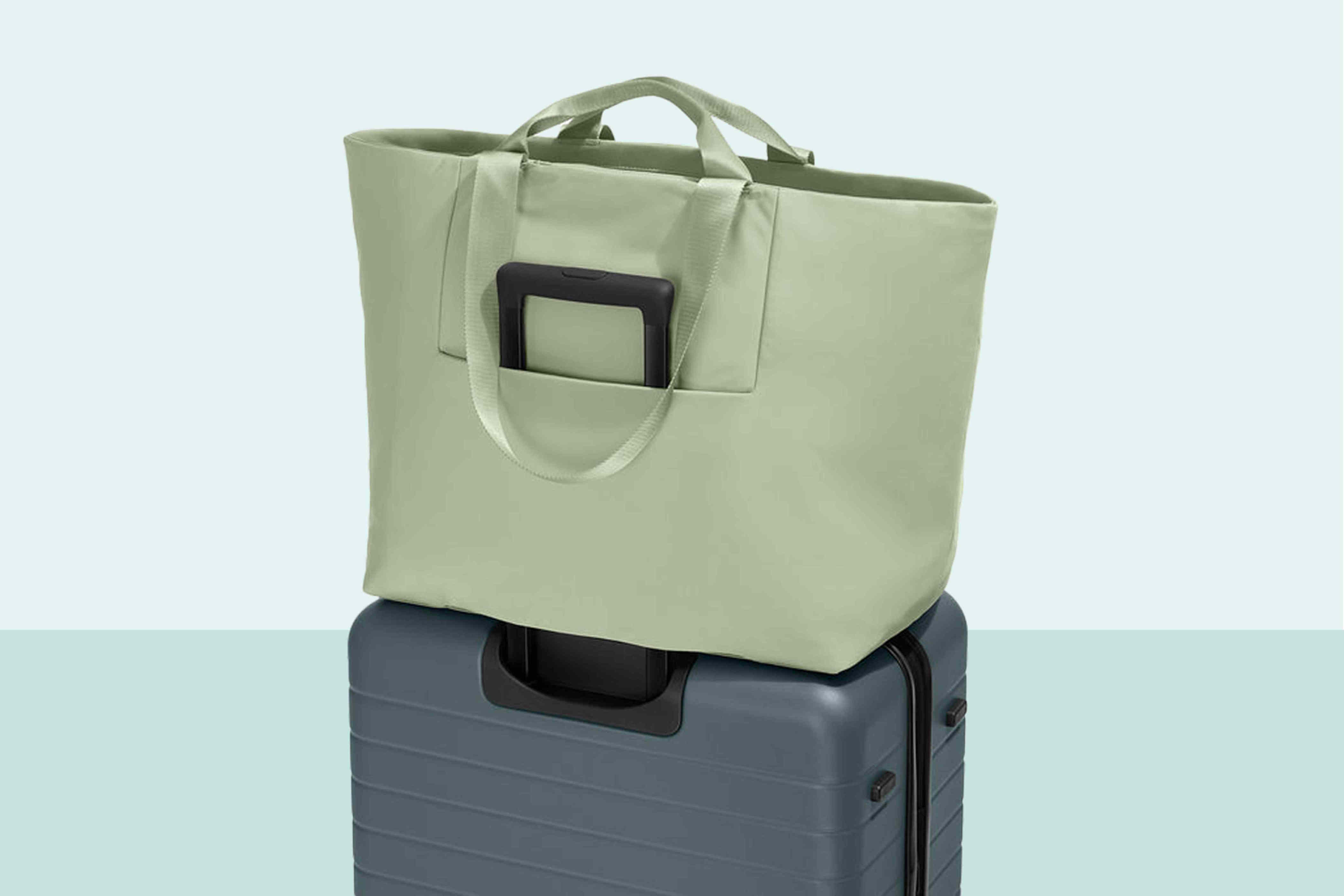 The Away suitcase sale has a rare discount on a roomy tote travelers love for week-long trips—now under $100
