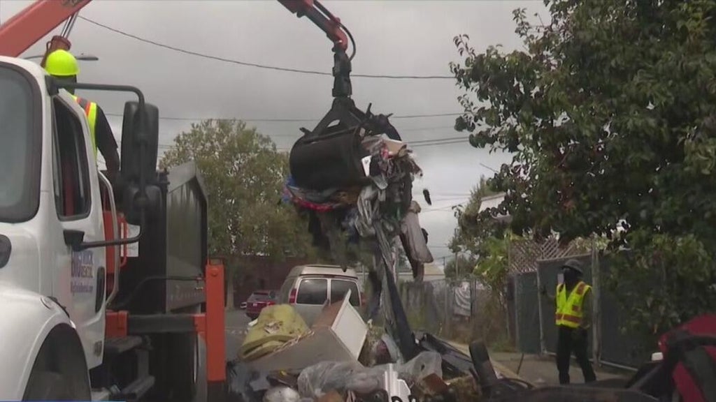 Oakland deploys new lightning loaders to clean up illegal dumping debris