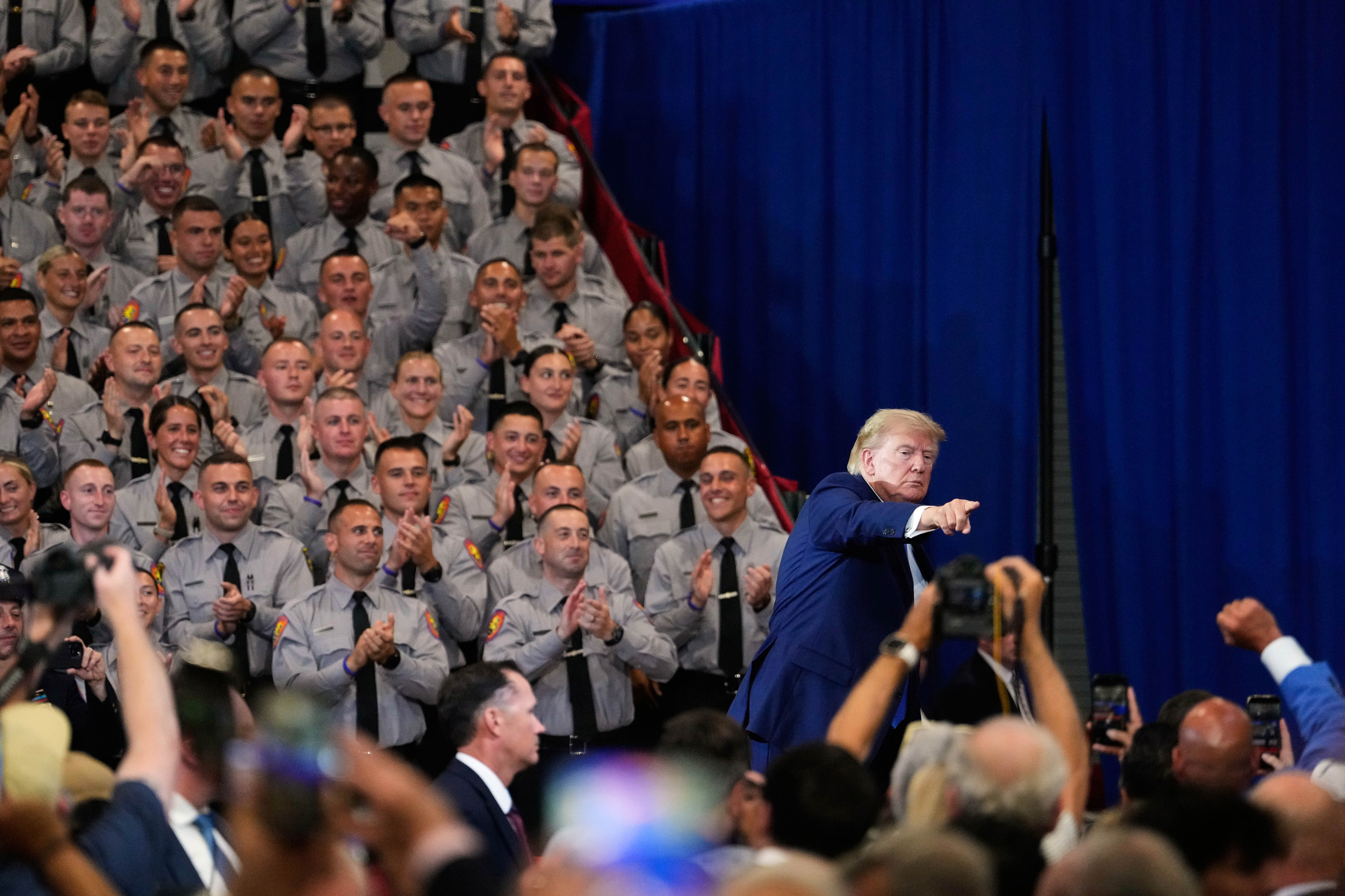 Trump stumps in NY suburbs, highlighting a dilemma for his party