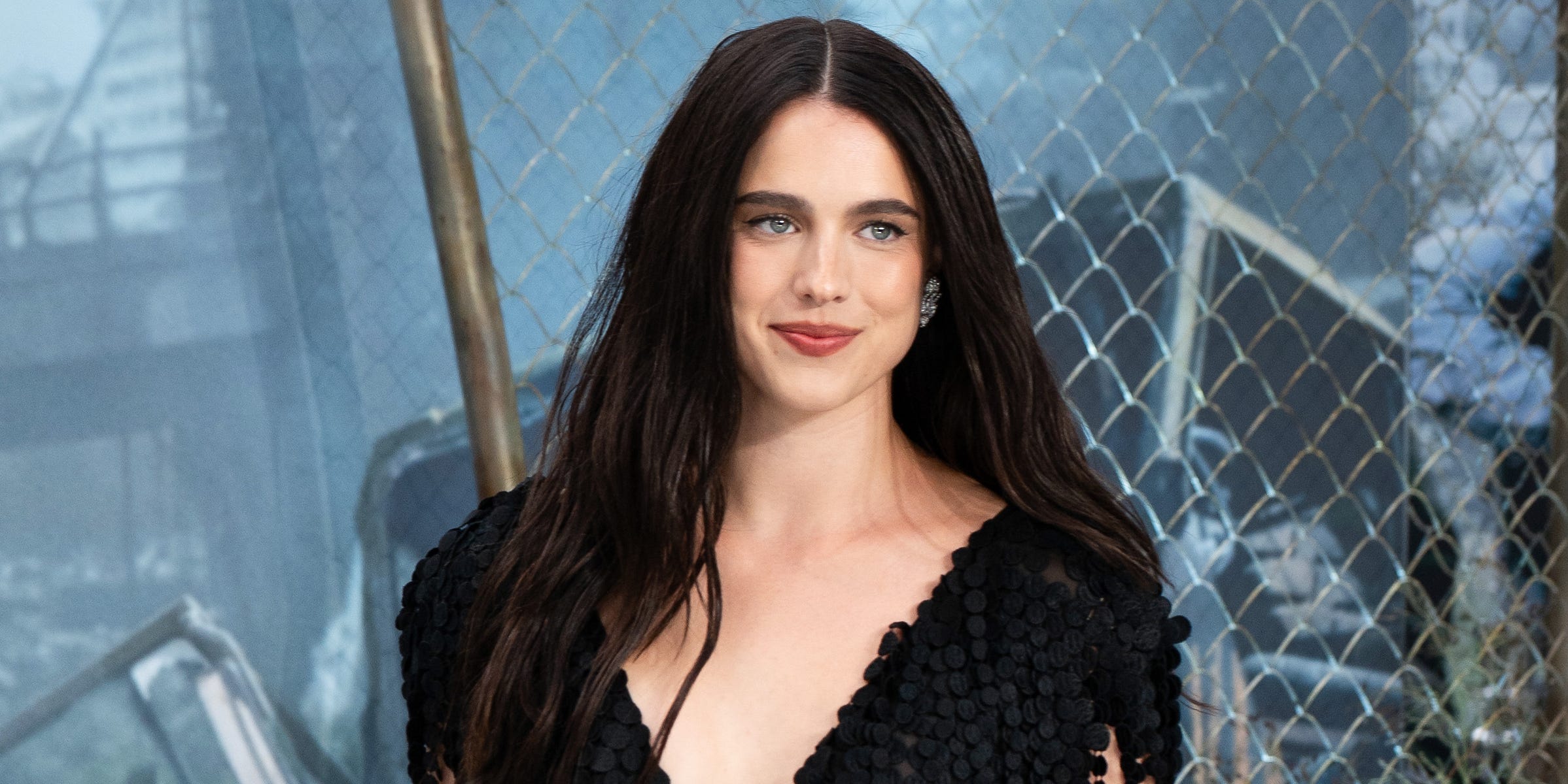 Margaret Qualley just walked the dirt-covered red carpet in Chanel's viral barefoot sandals