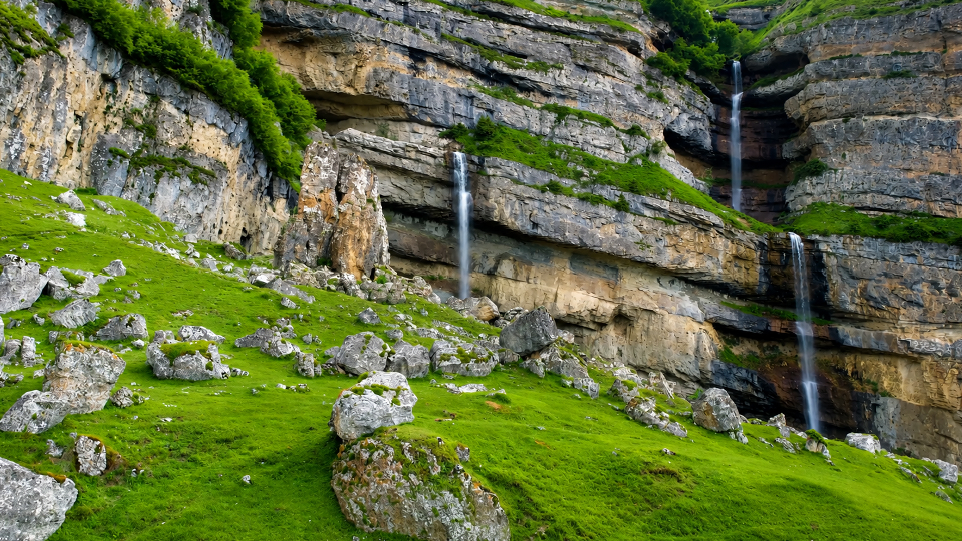 Why do waterfalls appear across this entire cliff?