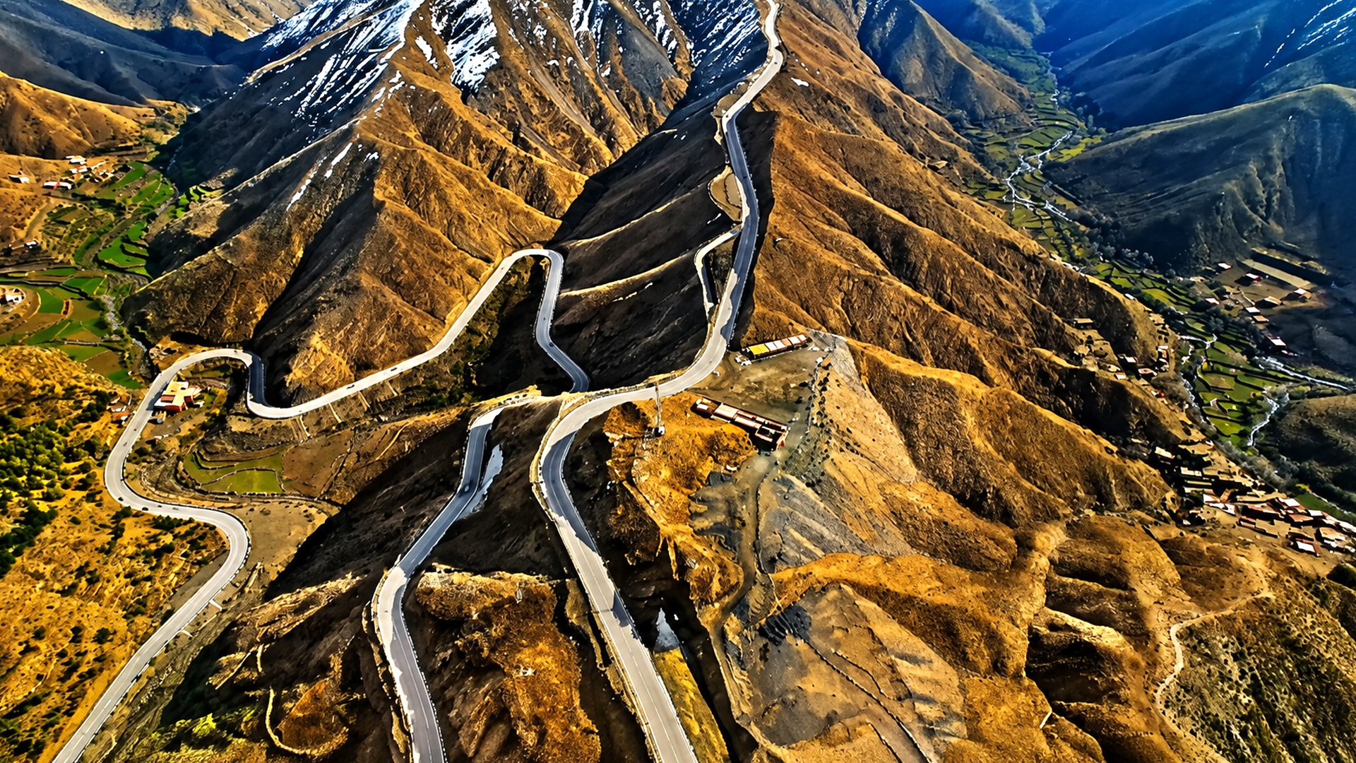 A Winding Mountain Road Climbing Through Morocco s High Atlas