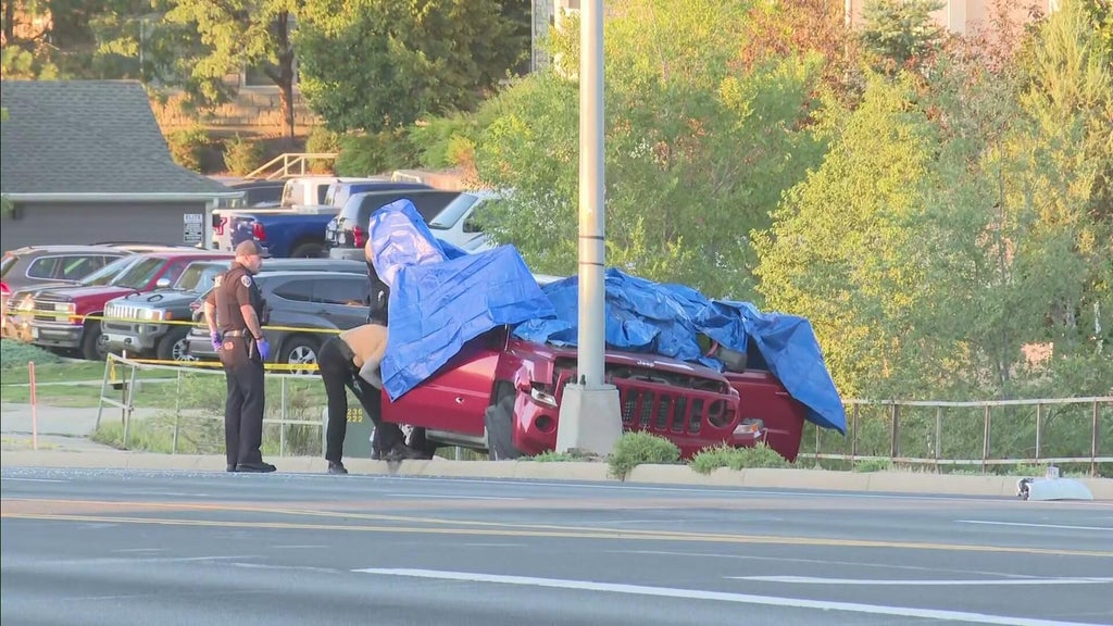 1 dead, 1 injured in shooting discovered after SUV crashed into pole north of Denver