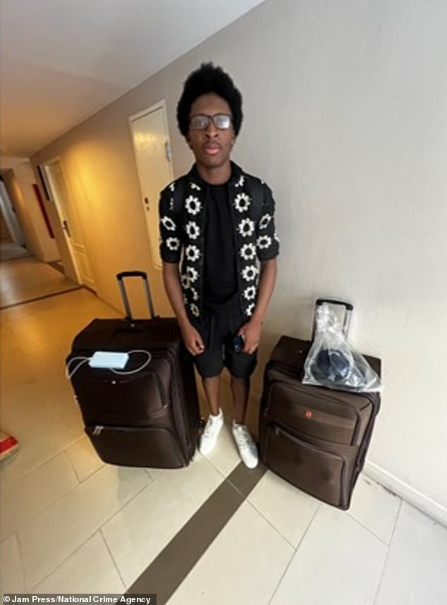 Carsten Kyei with suitcases prior to return flight