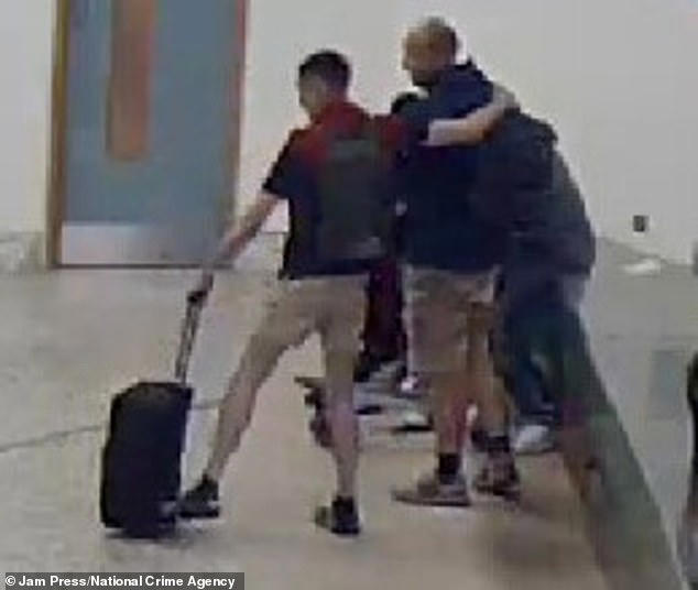 Lewis Ross in conversation with Lloyd at Birmingham Airport