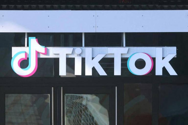 FILE PHOTO: A logo is displayed over a door at the U.S. headquarters of the social media company TikTok in Culver City, California, U.S. January 17, 2025. REUTERS/David Swanson/File Photo