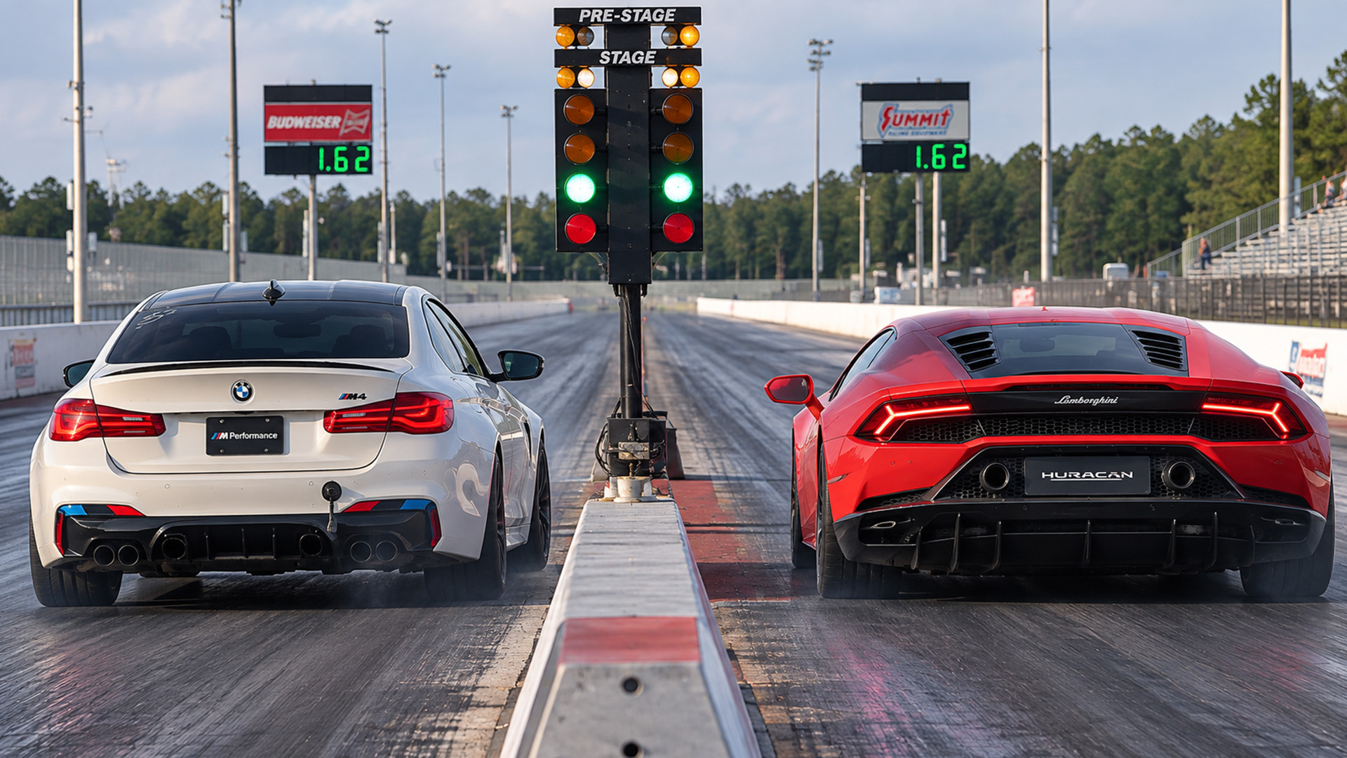 Modified BMW M5 challenges Lamborghini Huracán drag race