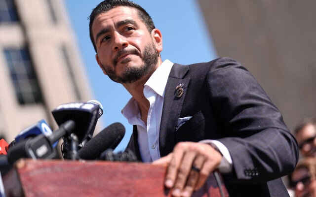 Abdul El-Sayed speaks during a news conference at the Spirit of Detroit shortly after winning the Democratic nomination for US Senate in Michigan, August 5, 2026. (AP Photo/Julia Demaree Nikhinson)