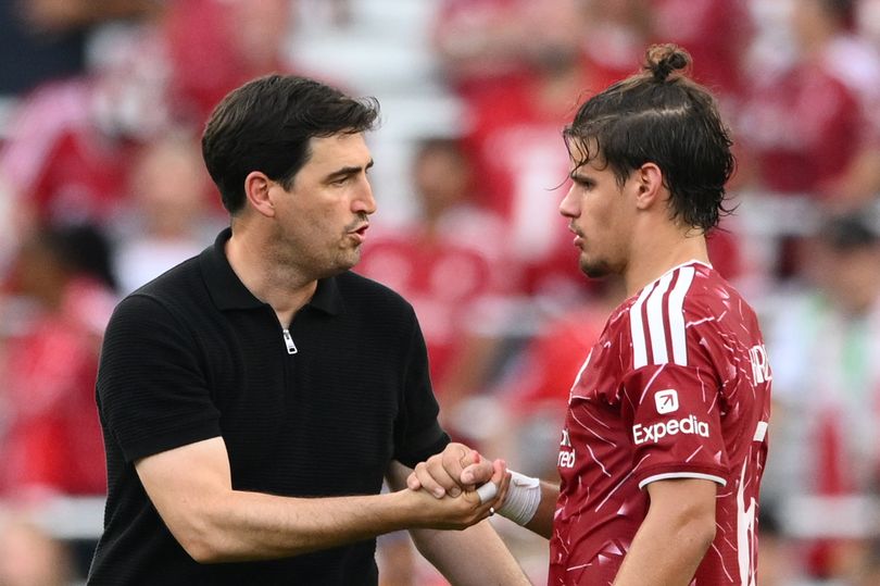 Liverpool head coach Andoni Iraola and left-back Milos Kerkez