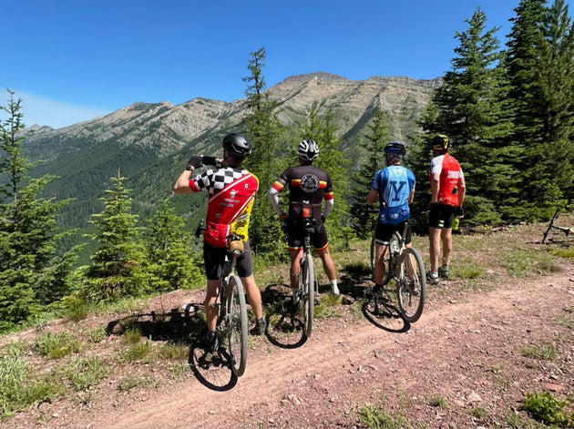The author and his fellow bikers staring out at the Continental Great Divide. “This was day two — 20 miles into our ride,” he writes.