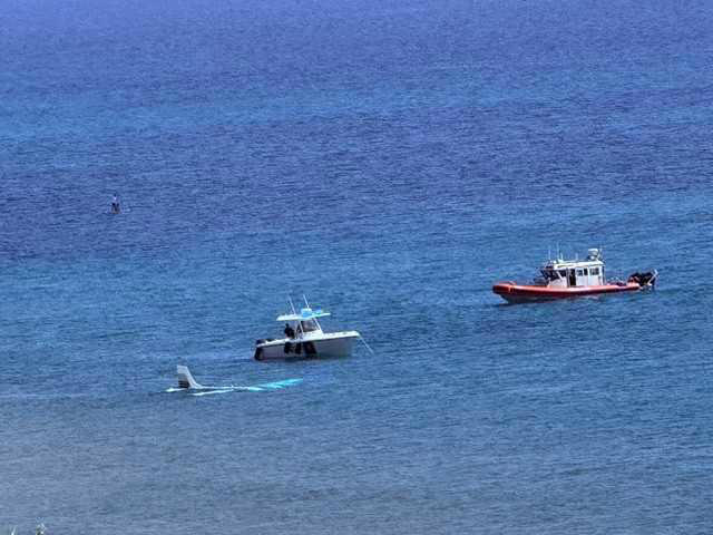 Videos show Piper plane landing in ocean near Boca Raton