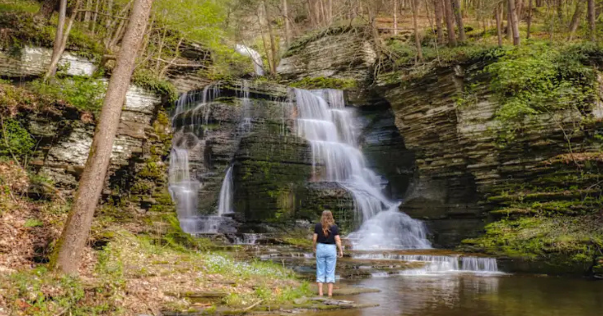 Wake up next to a waterfall at this New York campground