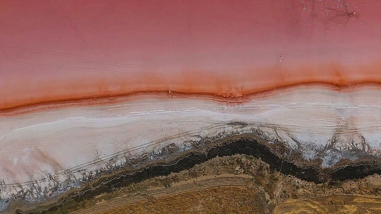 Turkish lake transforms from pink to white every summer
