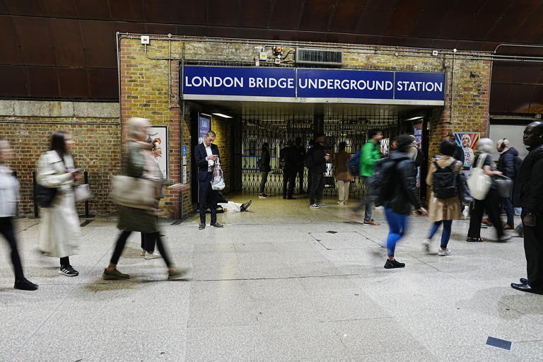 Commuters at busy rail and Tube stations can suffer from poor mobile phone connectivity (AFP/Getty)