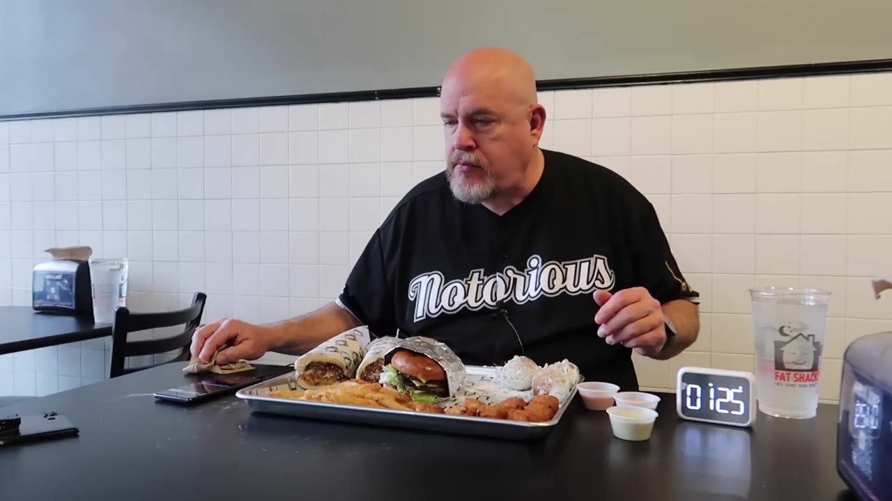How did he eat 5,000 calories in 15 minutes... burgers, fries, mac ...