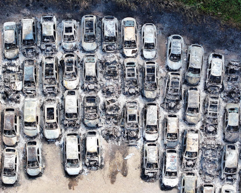 The blaze erupted at the Caldyne business park, a third-party parking site used by people flying from Gatwick airport. Photograph: Eddie Mitchell