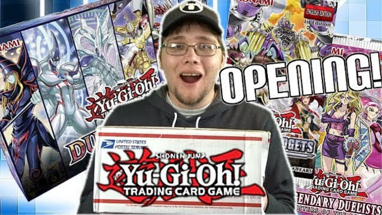 Opening a Yu-Gi-Oh mystery gift box with a PSA graded card
