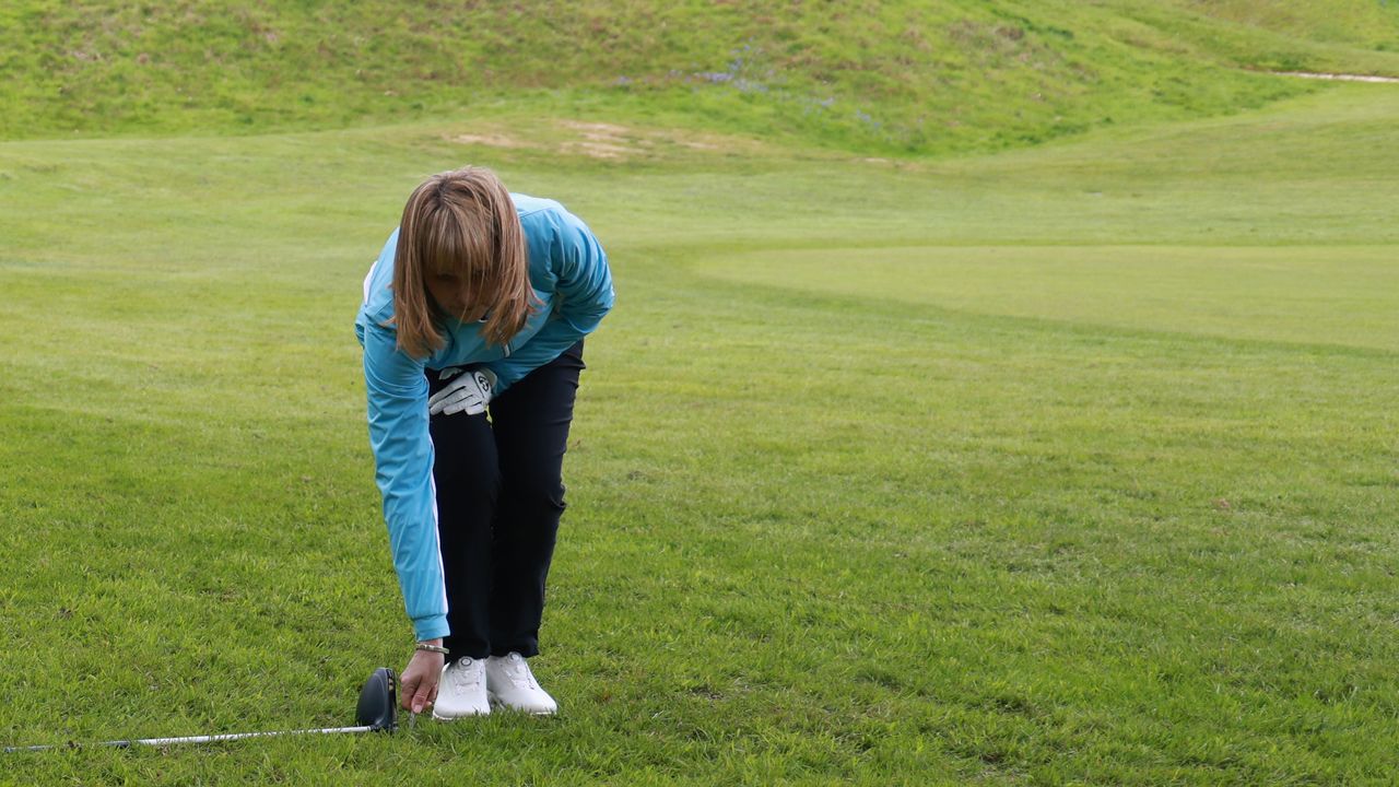 A fellow player measured two club-lengths instead of one and took her stroke. Is that a penalty?