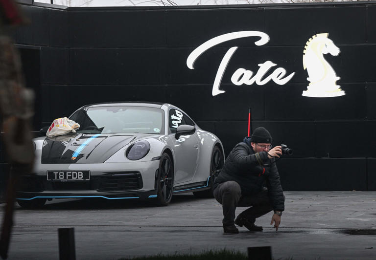 A car at The Hustlers University site belonging to Andrew Tate and his brother in Bucharest on 14 January 2023 (AFP/Getty)