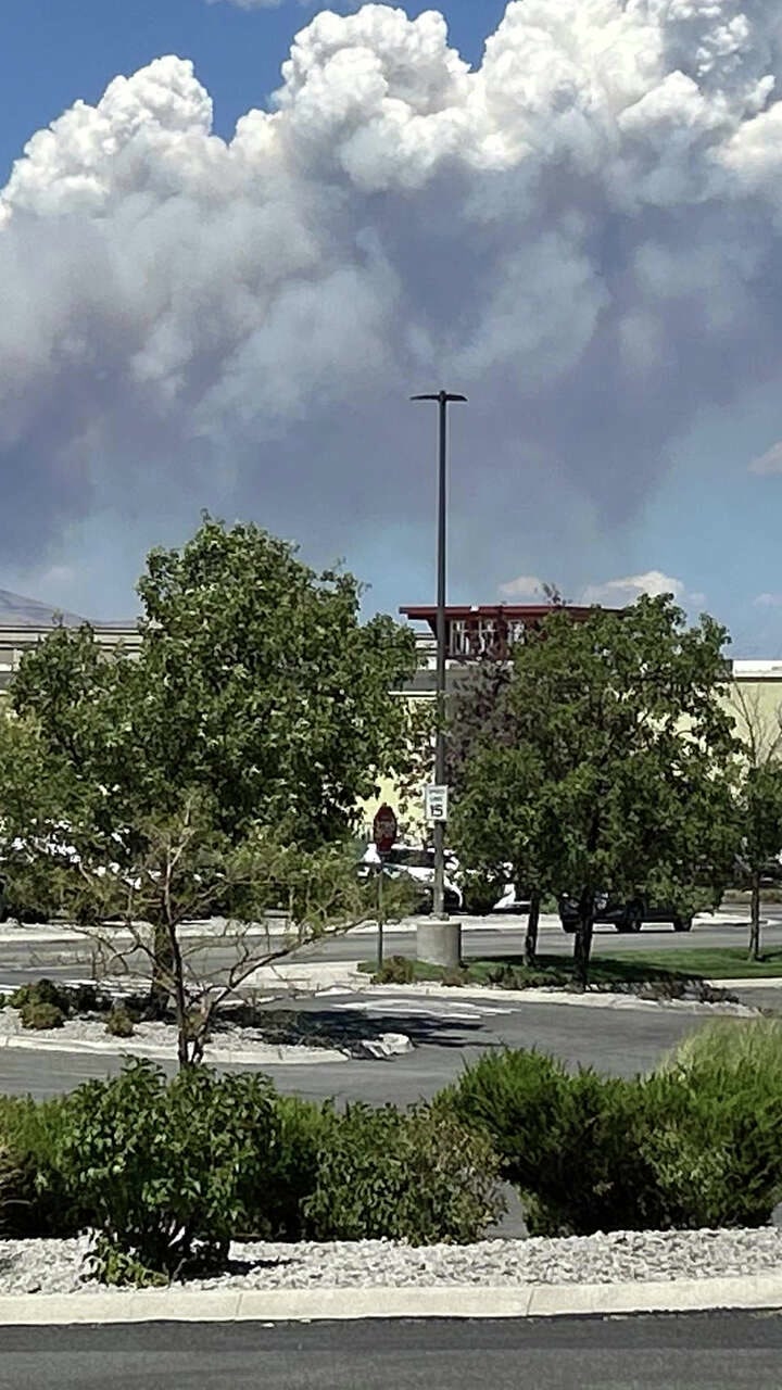 Hawk fire chars prominent mountain above Reno as some evacuees return home