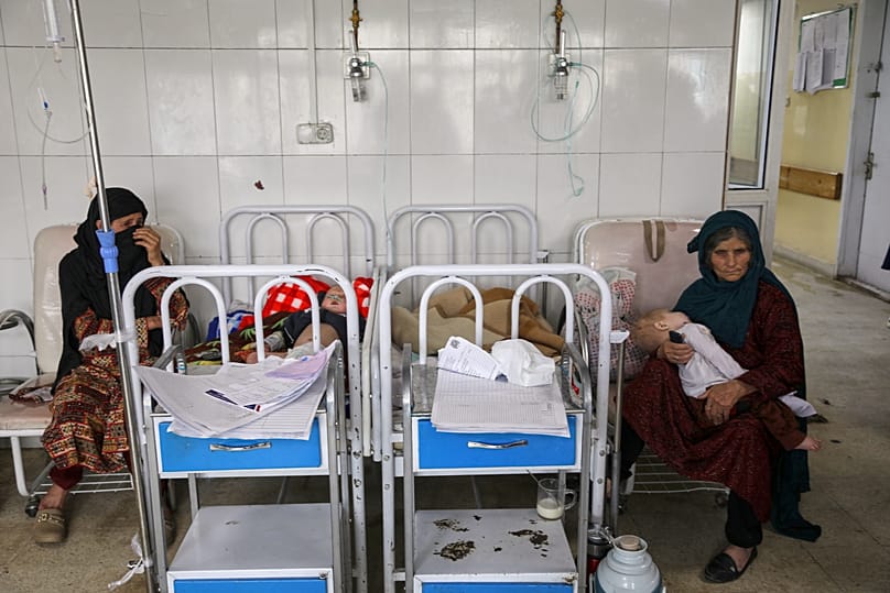 Afghan women care for their children in the malnutrition ward at Indira Gandhi Children's Hospital in Kabul, 15 February, 2026 AP Photo