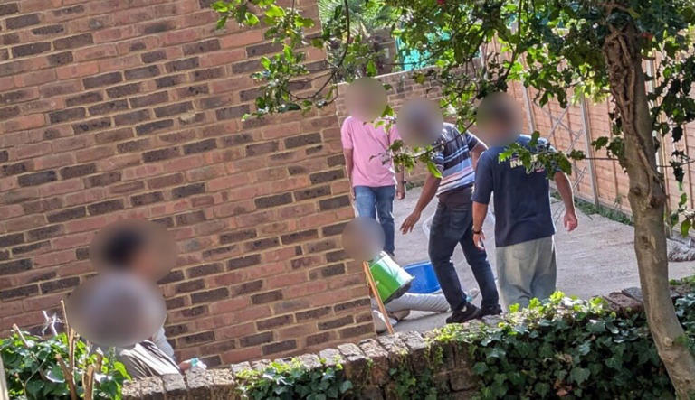 A worker has been suspended after shocking images appeared to show a resident being “kicked” at a care home in Croydon. (Pix via SWNS)