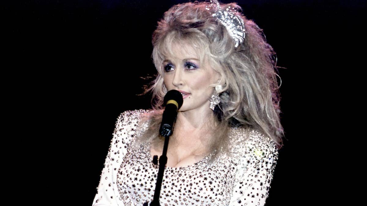 dolly-parton-s-hidden-tattoos-meaning-behind-her-body-art-revealed
