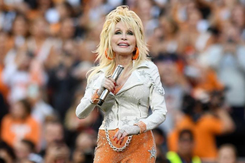 Dolly Parton's secret pastel tattoos that cover most of her body exposed