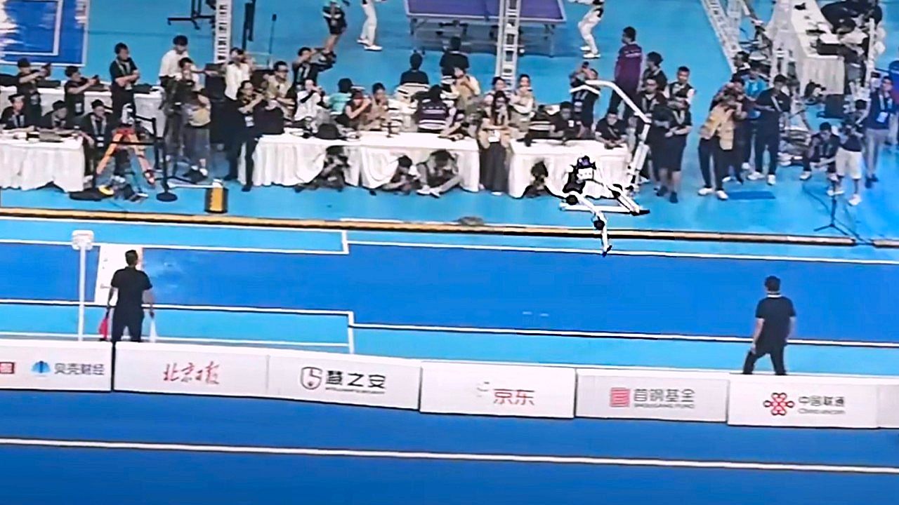 Humanoid robots face off in long jump at Beijing arena - winner leaps ...
