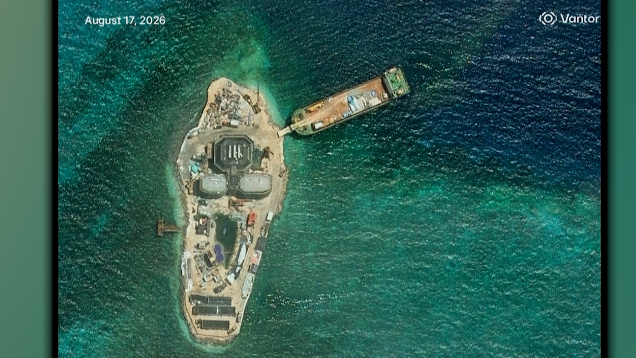 Satellite photos show new Chinese structure in disputed South China Sea