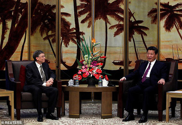 Mr Gates hopes to meet with China's president Xi Jinping in November to discuss solutions to mitigate the growing risks brought by AI (Pictured: The pair met at a conference in 2013)