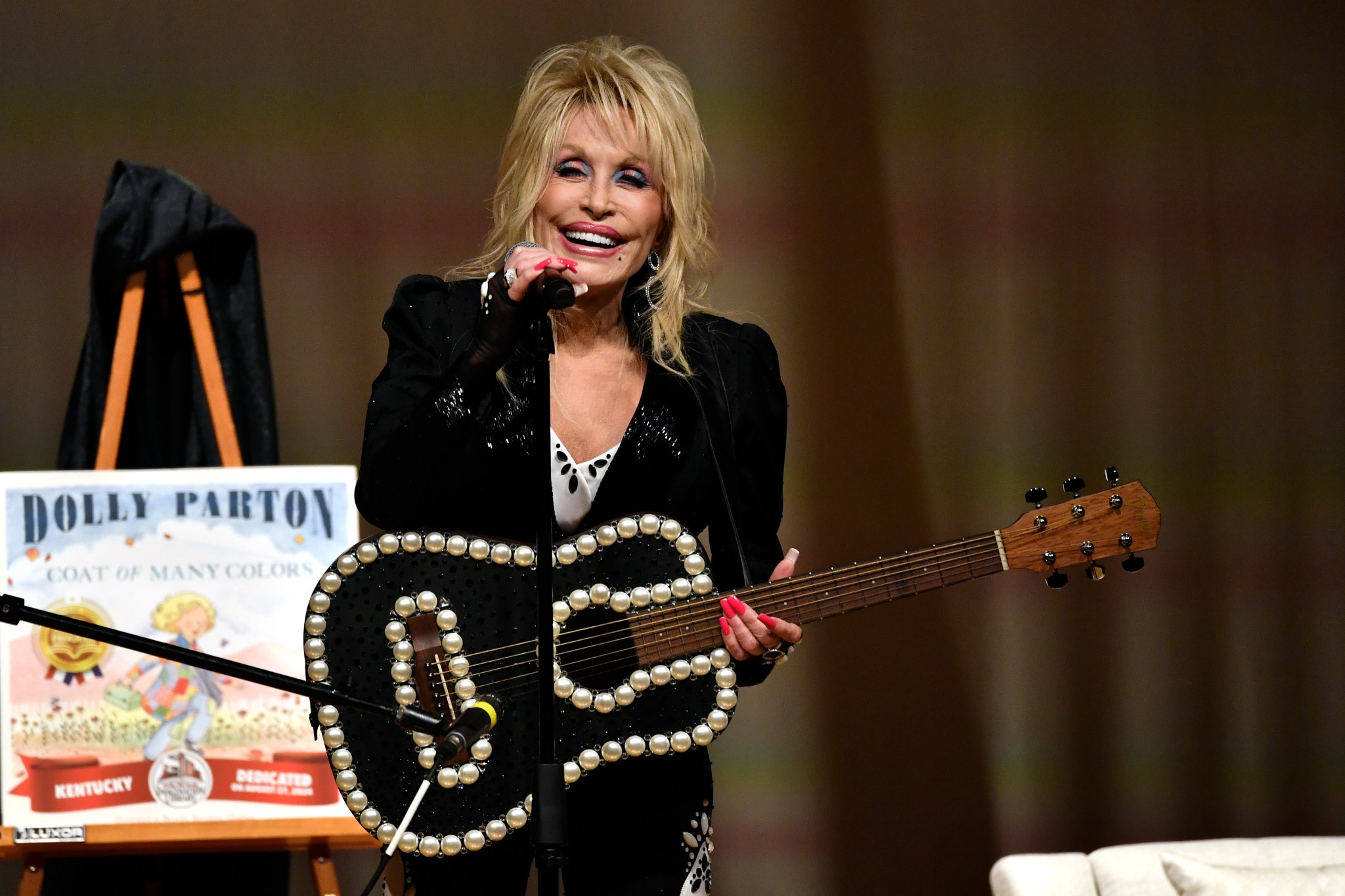 Republicans cut funding for Dolly Parton's child reading program