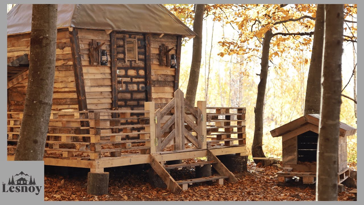 built-a-cabin-in-the-woods-from-pallets-alone-in-the-woods