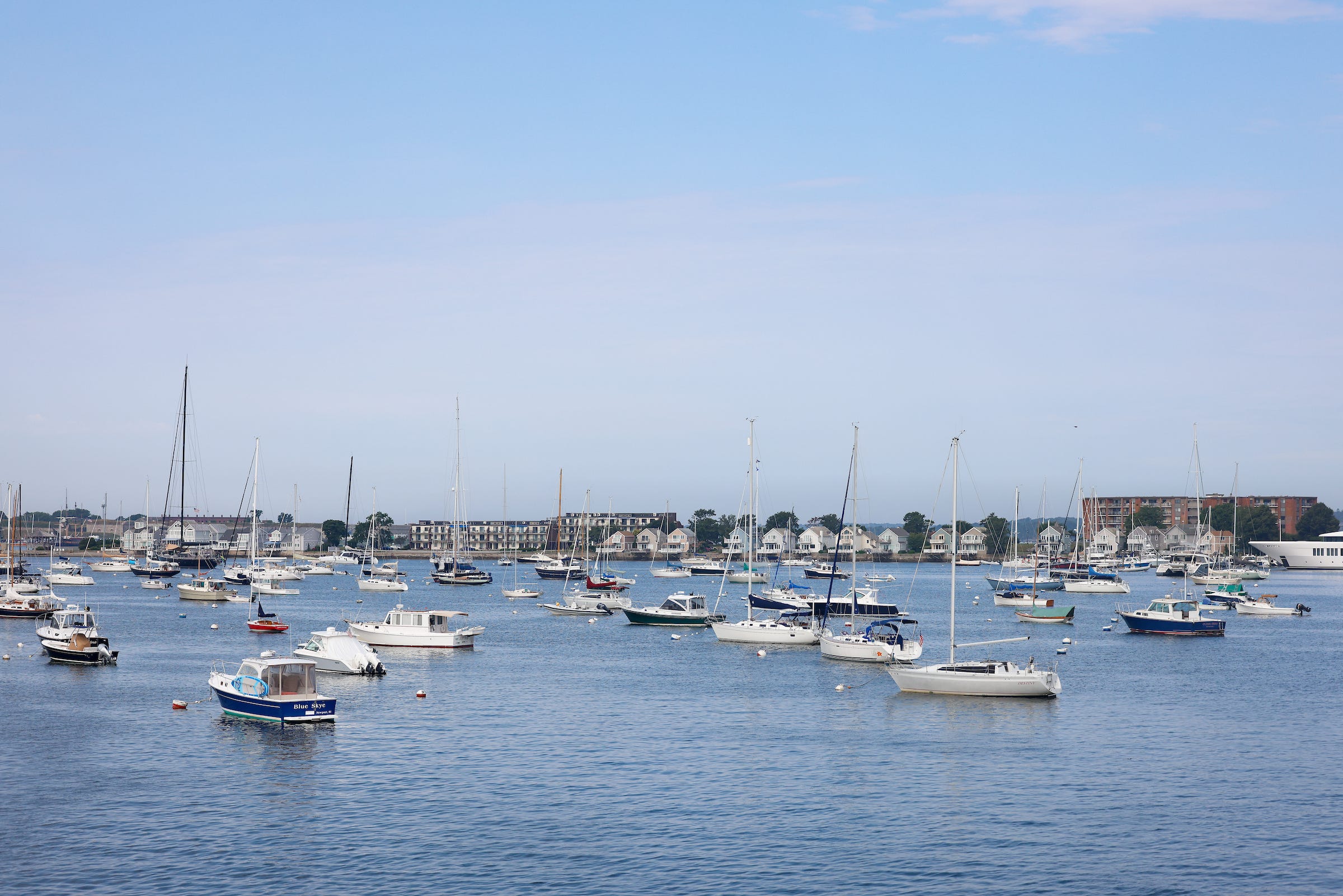 Officer shot, a suspect dead and a stolen boat captured in Newport Harbor