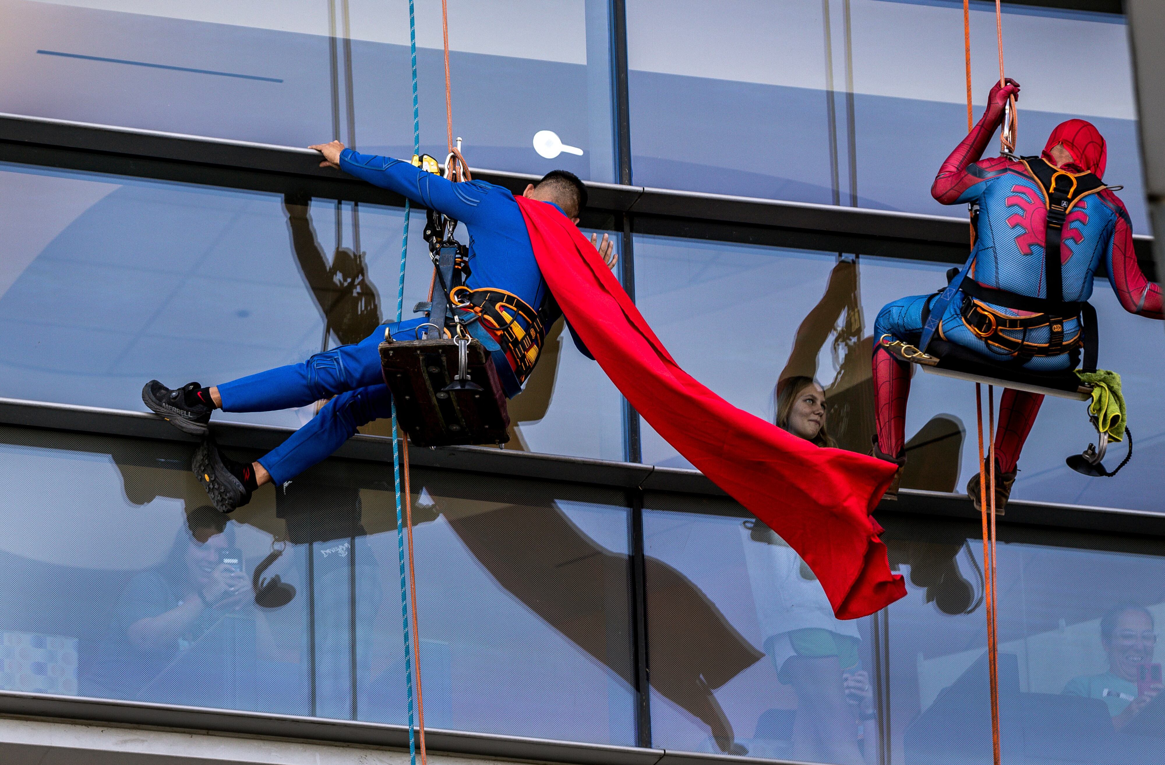 Superhero window washers visit Children's Hospital in Hershey