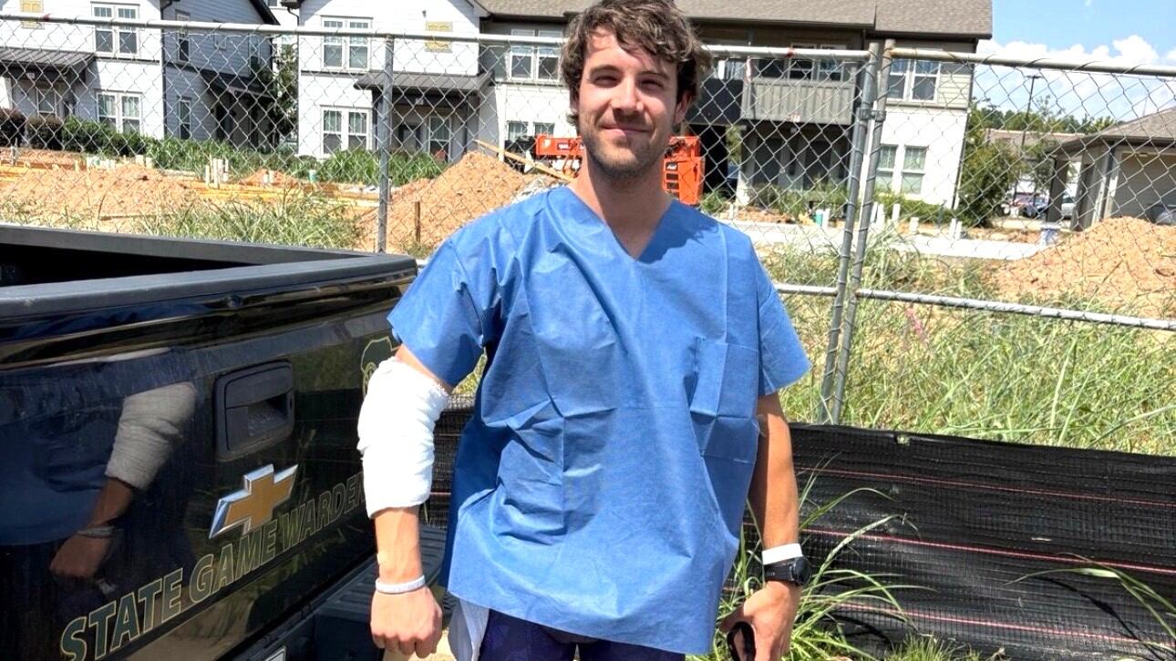 Man bitten by alligator in Savannah River back home, already running again