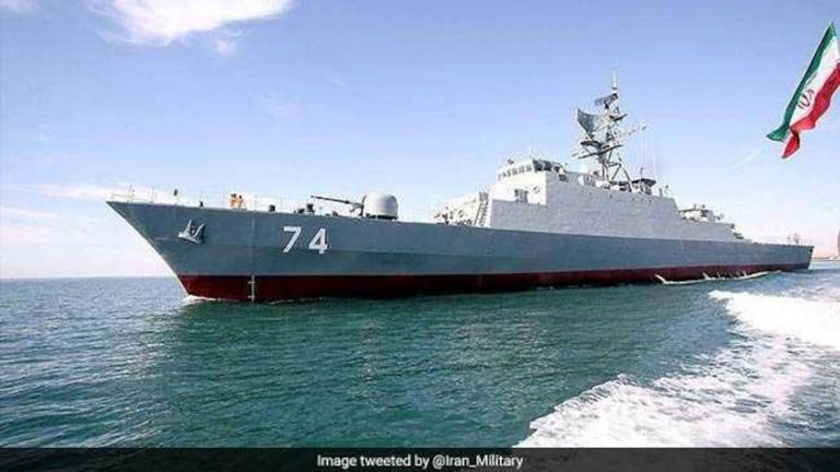 Iranian warship confronts Indian oil tanker attempting to cross the Strait of Hormuz.
