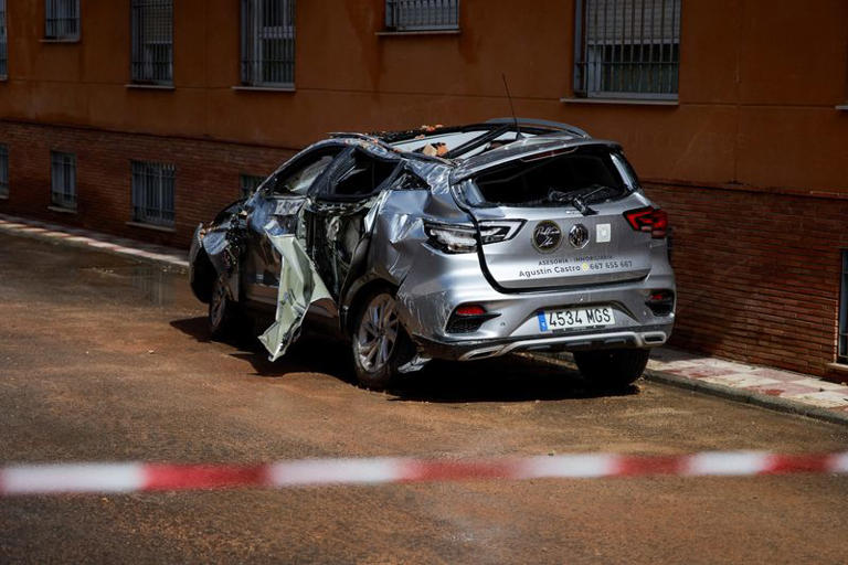 A vehicle sits wrecked after an earthquake of magnitude 5 struck southern Spain, in Armilla, Spain, August 15, 2026. REUTERS / Fermin Rodriguez