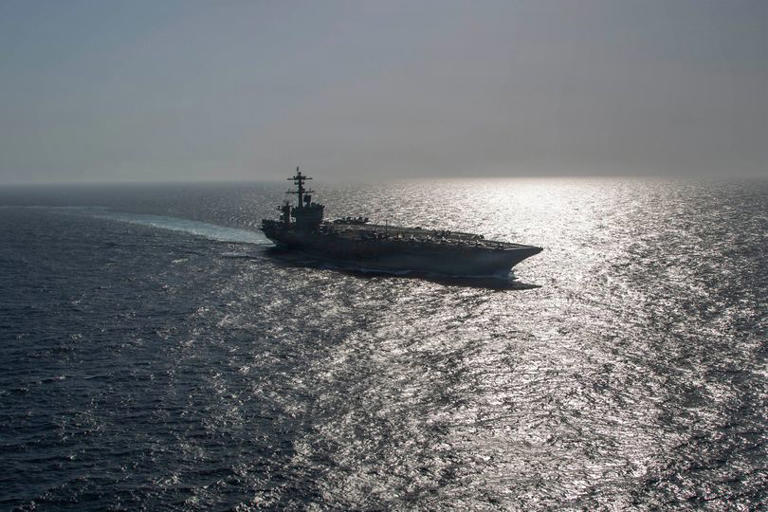 This US Navy handout photo released on May 12, 2026, by US Central Command Public Affairs shows Nimitz-class aircraft carrier USS Abraham Lincoln sailing in the Arabian Sea on May 8, 2026. Iran's