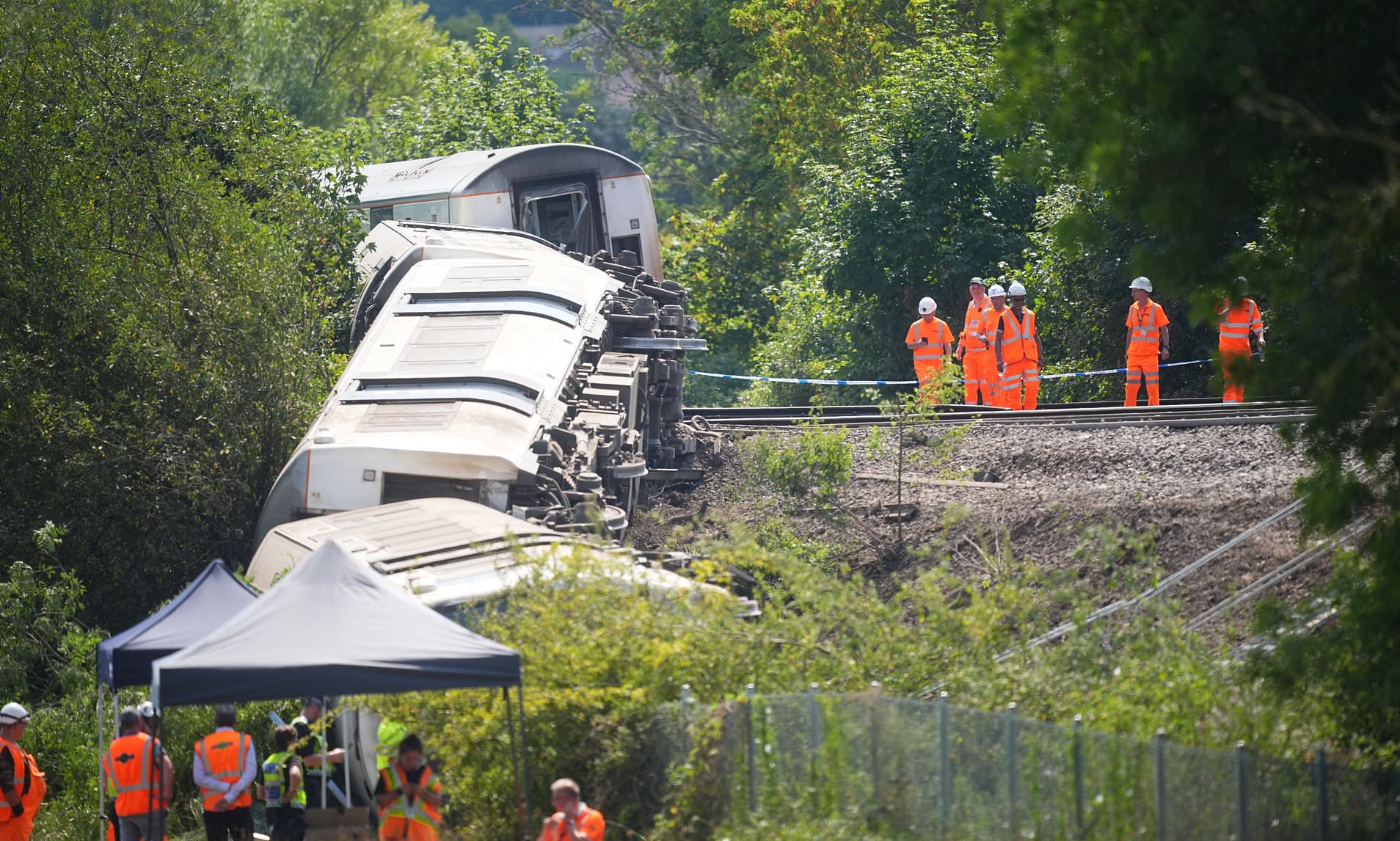 Commuters face chaos as trains are axed over fears record-breaking heatwave could damage rail tracks