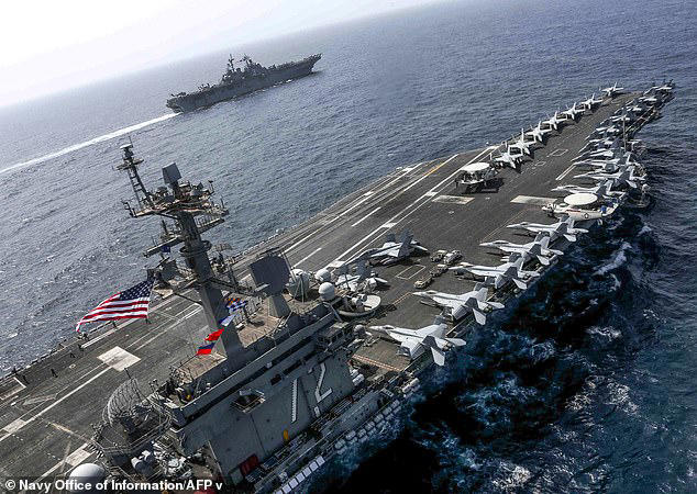 Earlier Sunday, it was confirmed that the USS Abraham Lincoln (pictured), which has seen sailors on deployment since November, will be replaced by the USS George Washington