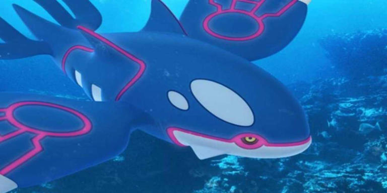 The legendary Kyogre swimming in a vast open ocean.