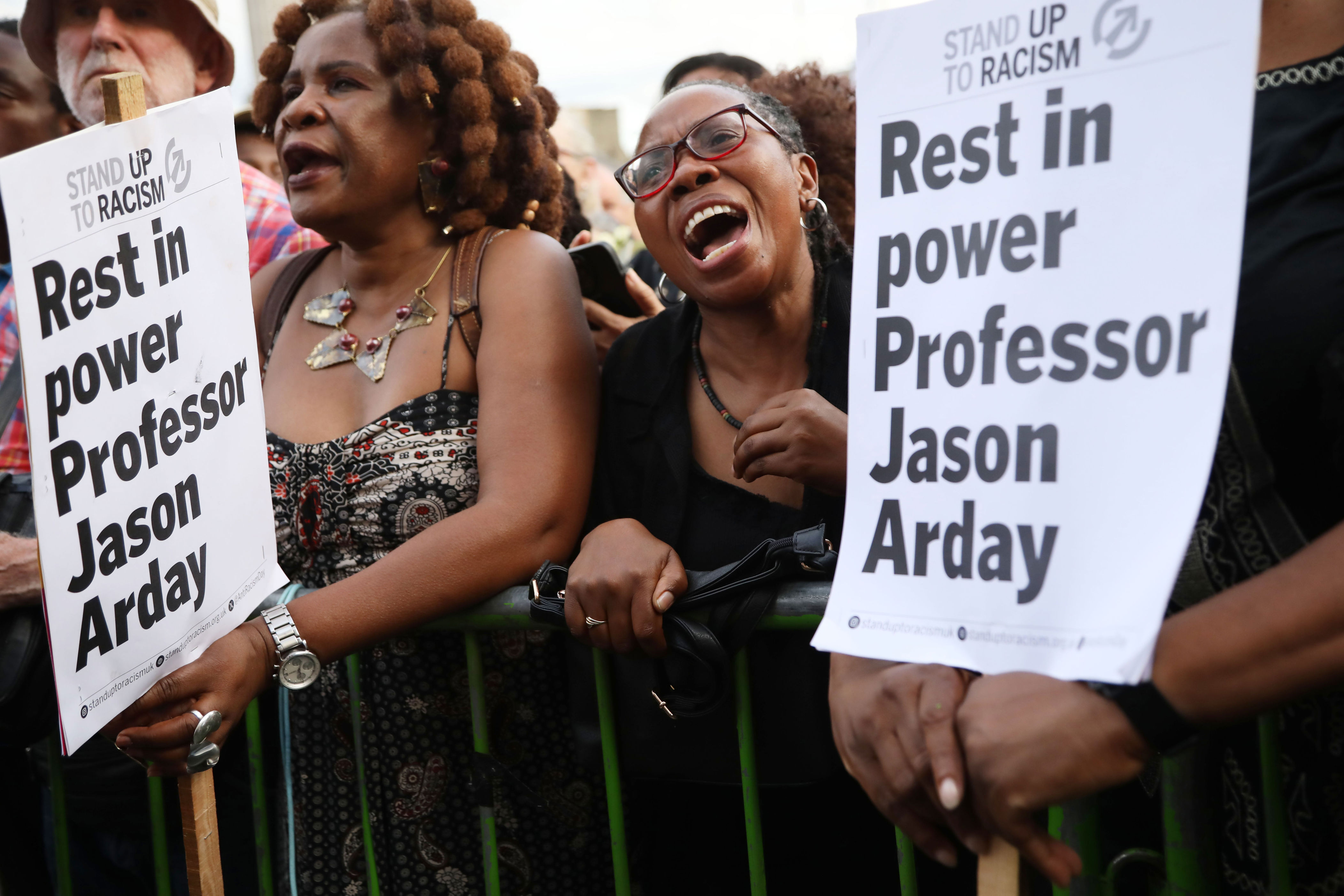 Attendees hold placards for Jason Arday (Getty)