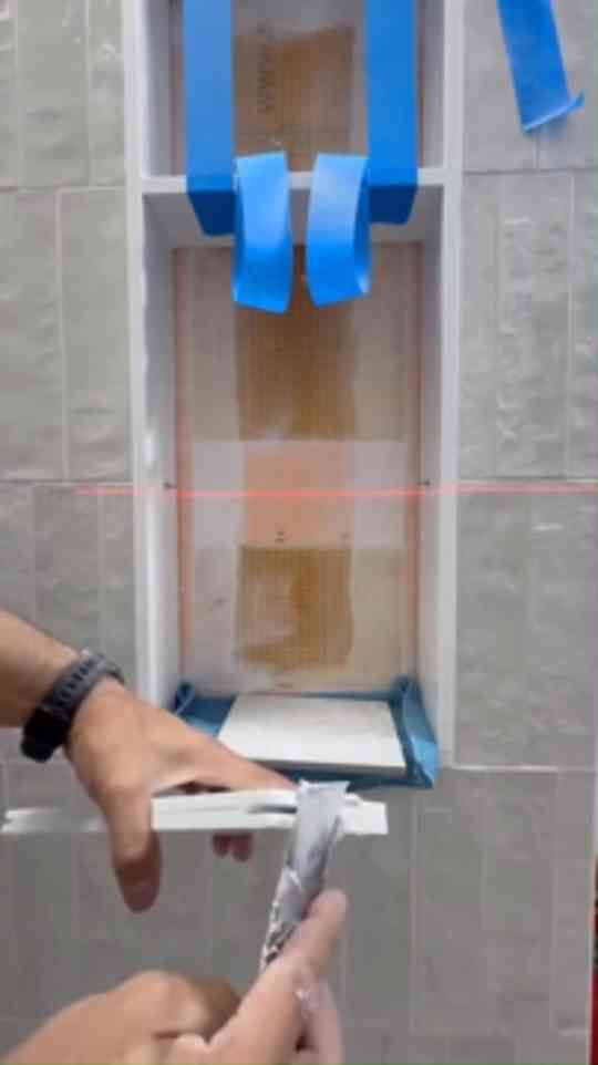 This simple laser level hack makes tile work much easier
