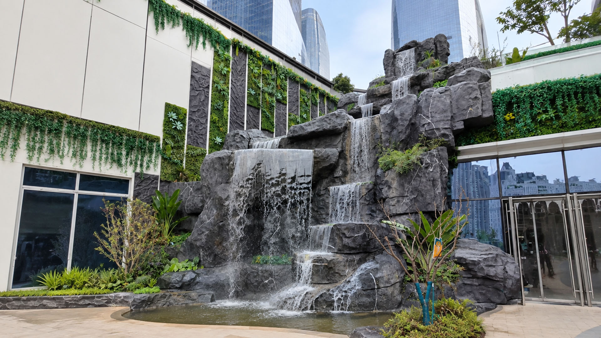 This giant rock waterfall stands inside a Chinese mall