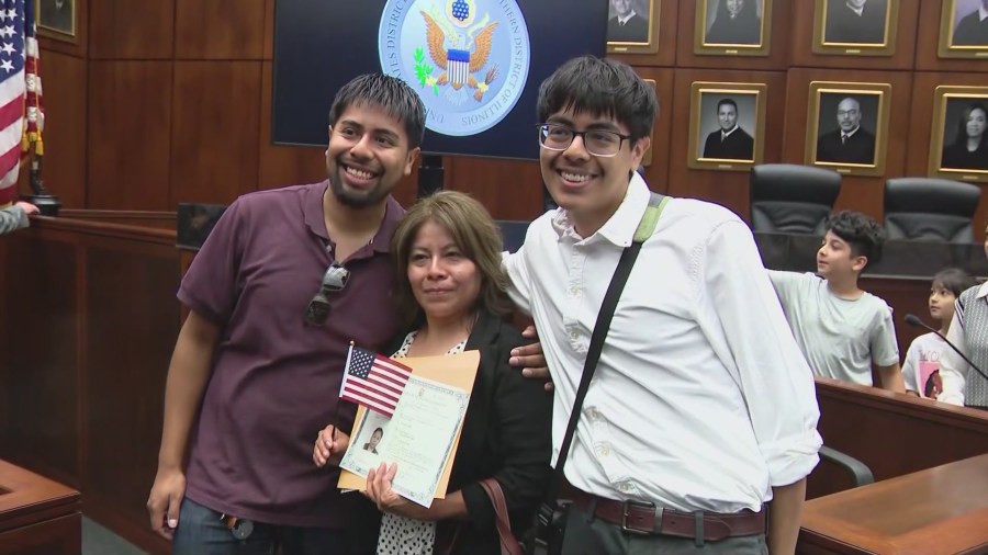 'God bless America': 97 people become US citizens at Dirksen Federal Building