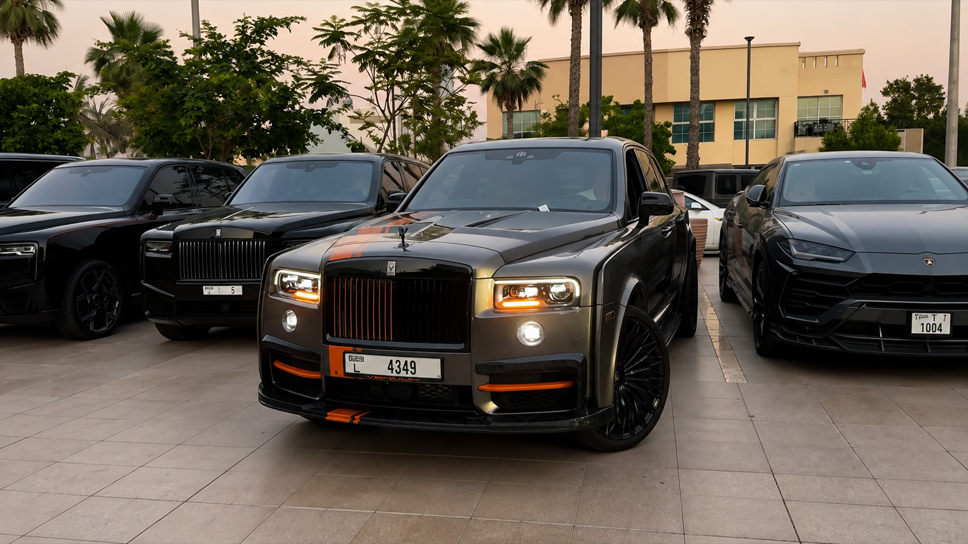 Billionaire positions a Mansory Rolls-Royce Cullinan between Dubai exotics