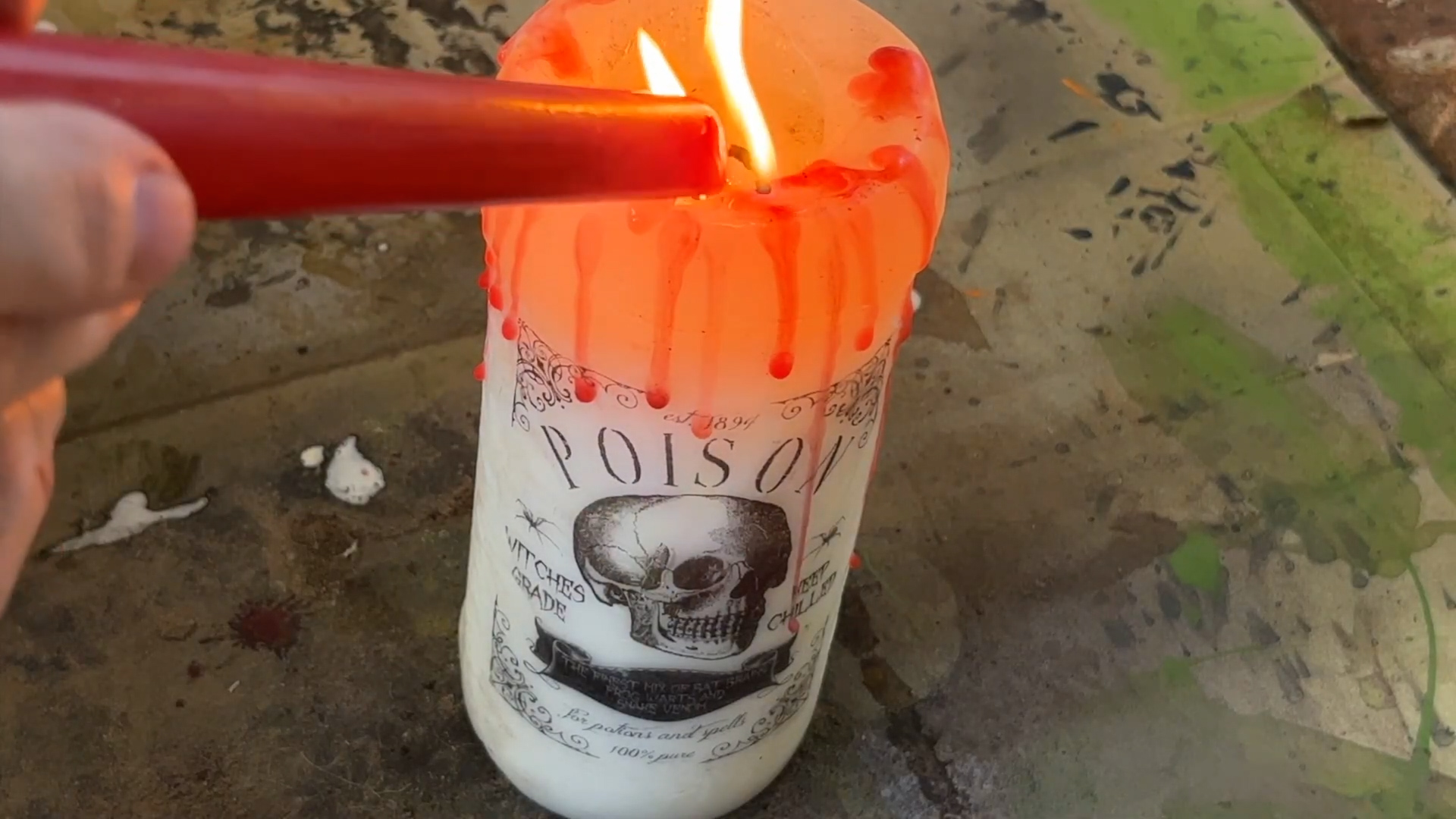 Make a spooky blood-drip candle from thrifted finds