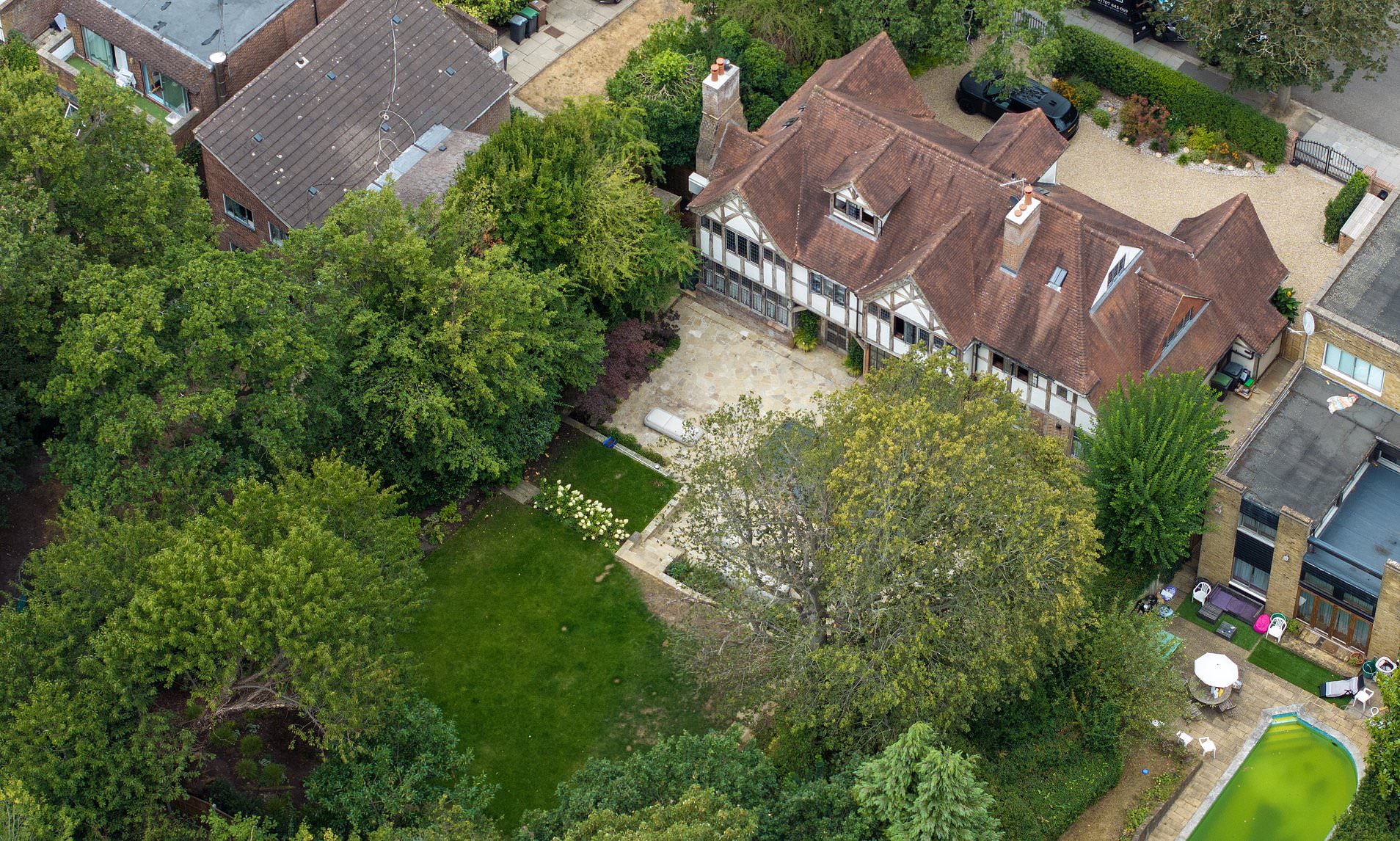 What an oasis! Liam Gallagher's north London home stays green with grass intact despite drought