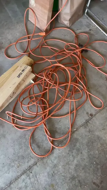 DIY bucket hack tames tangled extension cords